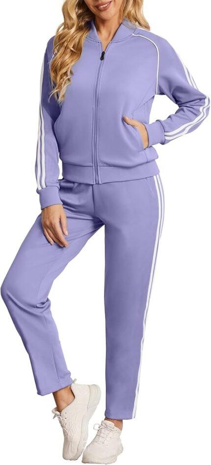 Women’s two-piece tracksuit with striped zip-up jacket and jogger pants with pockets