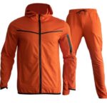 Men’s two-tone athletic tracksuit with adjustable hoodie and tapered joggers